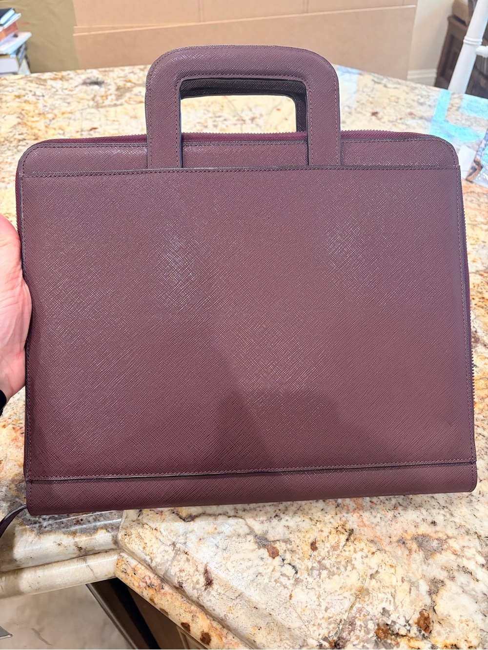 Tumi business portfolio with handles in Plum